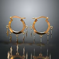 Elegant Shiny Gold Hoop Earrings With Decorative Pendants And Reflective Design
