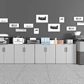 Organized Office Workspace With Essential Appliances Cabinets Framed Wall Pictures And Printers