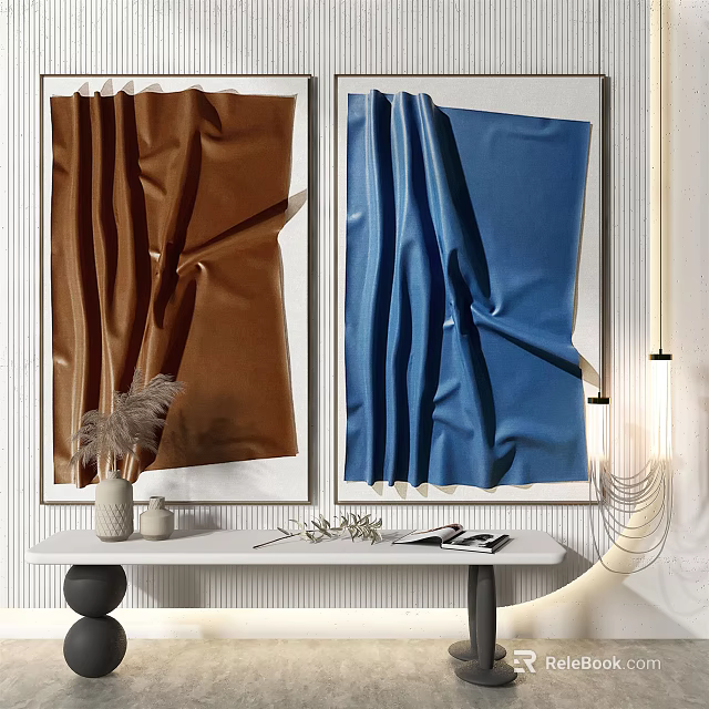 Two Brown And Blue Fabric Paintings Hanging On Wall With Table And Decorations 3d model 