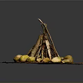 Natural Stacked Arbor Branches Forming Campfire Surrounded by Stones on Earthy Ground