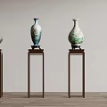 Four Decorative Floral Vases with Various Colors and Patterns Arranged on Brown Stands
