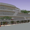 Modern Commercial Complex With Curved Exterior Glass Curtain Walls And Surrounding Trees Street Lamps