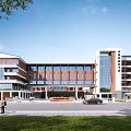 Multi Story Modern School Building With Red Brick Facade Glass Windows And Green Lawn Area