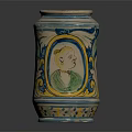 Colorful Decorative Jar With Blue Yellow White Patterns And Portrait Figure