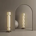 Modern Cylindrical Floor Lamps With White Shade And Brass Base In Archway Setting