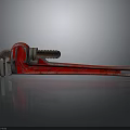 Red Vintage Pipe Wrench Tool On Black Background With Reflection Effect