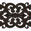 Intricate Artistic Carving In Metallic Material With Symmetrical Curled Patterns And Decorative Design Elements