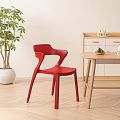 Red Modern Leisure Chair With Wooden Table And Green Plant In Light Room