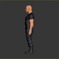 Bald Man With Muscular Build In Navy Blue T Shirt Pants Against Gray Background