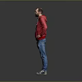 Man In Red Hoodie And Blue Jeans Standing With Hands On Hips Against Gray Background