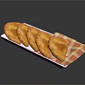 Golden Fried Dumplings Served On White Plate With Red And White Checkered Napkin