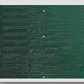 Detailed Green Printed Circuit Board With Intricate Circuitry And Mounting Holes