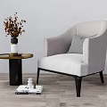 Gray Single Sofa With Round Side Table Vase Dried Flowers Wooden Floor