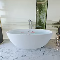 White Freestanding Bathtub With Red Petals On Water And Landscape Painting Background