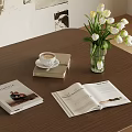 Decorative Ornament Set With Coffee Cup Books Open Magazine White Tulips In Vase On Table