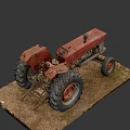 Old Red ENOR Utility Tractor with Large Tires on Dirt Ground