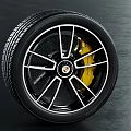 Car Wheel Featuring Modern Alloy Rim And Yellow Brake Caliper Black Tire Design