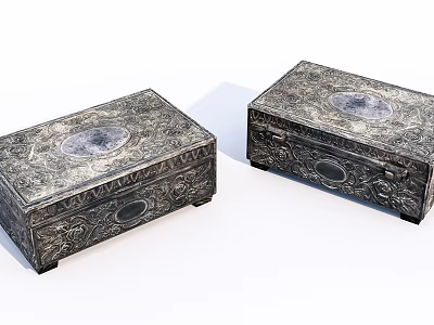 Two Silver Jewelry Boxes With Intricate Carvings And Circular Medallions 3d model