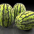 Three Juicy Watermelons with Green and Black Stripes on Shiny Surface