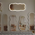 Stylish Mirrors with Various Shapes in Wall Decor for Room with Checkered Rug and Plants