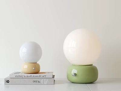 Modern Minimalist Table Lamps with Spherical White Shades and Green Yellow Bases on Books 3d model