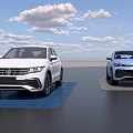 Two Modern SUV Vehicles In White And Blue Parked On Display Stand With Clear Sky