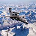 High Altitude Military Fighter Jet Flying Over Snow Mountains With Red Star On Tail