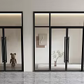 Black Framed Glass Double Doors in Interior with Marble Floor Teddy Bear and Potted Plant