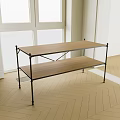 Two Tier Wooden Shelving Unit With Black Metal Frame In Room With Window And Light Wooden Floor