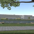 Modern Industrial Factory Building Exterior With Lakefront Greenery Trees And Landscaping