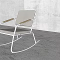 Modern Minimalist Rocking Chair With Metal Frame Wooden Armrests And Beige Cushion