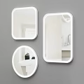 Stylish Black Framed Mirrors In Different Shapes On Grey Bathroom Wall With Sink Reflection