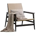 Modern Comfortable Leisure Chair With Black Frame Beige Cushion And Knitted Blanket