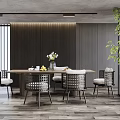 Modern Restaurant Dining Area With Wooden Table Rattan Chairs And Green Plant Decor
