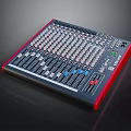 Professional Commercial Audio Mixer with Multiple Control Knobs and Faders on Panel Red Black Design