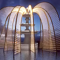 Art Installation With Illuminated Arch Structures White Tiered Base And Water Reflection 3d model