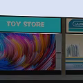 Toy Store And Laundry Shopfront Window With Colorful Wavy Pattern Background And Clothes