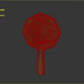 Green Round Handled Artifact With Intricate Patterns On Dark Background