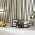 Kitchen Appliances on Stove with Blue Flames Lemons Wine Bottle Striped Wall and Green Plant