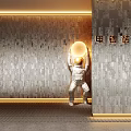 Modern Textured Tile Wall Design with Astronaut Sculpture and Warm Lighting Accents