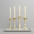 Elegant Gold Candle Holders With Four White Candles On Silver Tray Design