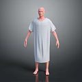 Human Figure Sculpture in Polka Dot Hospital Gown with Bald Head Standing on Gray Background