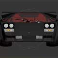 Classic Sports Car With Dark Body Red Interior Gold Wheels Square Headlights And Rear Spoiler