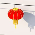 Red Lantern Household Item With Yellow Tassels Hanging On Black Pole White Wall With Shadow