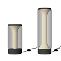 Modern Two Different Sizes Transparent Cylindrical Table Lamps With Black Base And Illuminated Glass Shade
