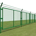 Green Metal Diamond Mesh Fence With Gate On Green Grass Field