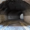 Old Road Tunnel With Arched Ceiling Graffiti Walls And Double Yellow Lines