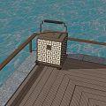 Outdoor Lantern With Square Lattice Design Illuminating Wooden Deck By Water