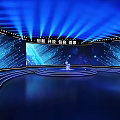 Modern Stage Design With Blue Lighting Circular Platform Large Screens Displaying Innovation Openness Inclusiveness Progress