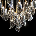 Modern Crystal Chandelier with Transparent Hanging Pendants Shiny Design Against Black Background
